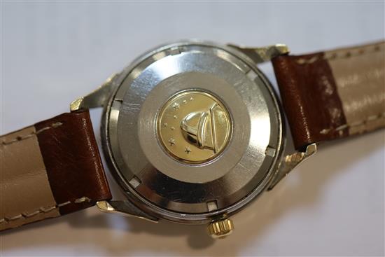 A gentlemans 1960s steel and gold plated Omega Constellation automatic pie pan black dial wrist watch,